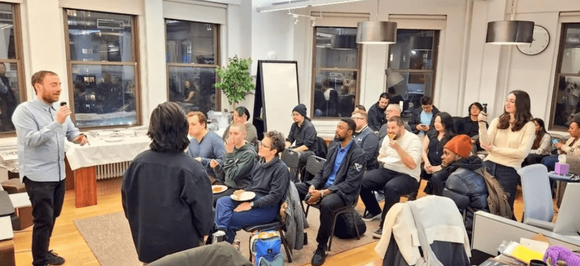 A B-HiTech team member in the audience at a technology meetup in New York